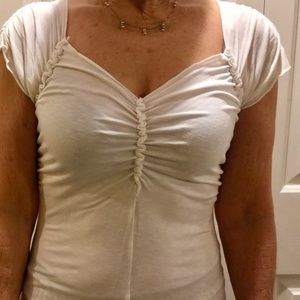 Women’s white v-neck with ruffles short sleeve